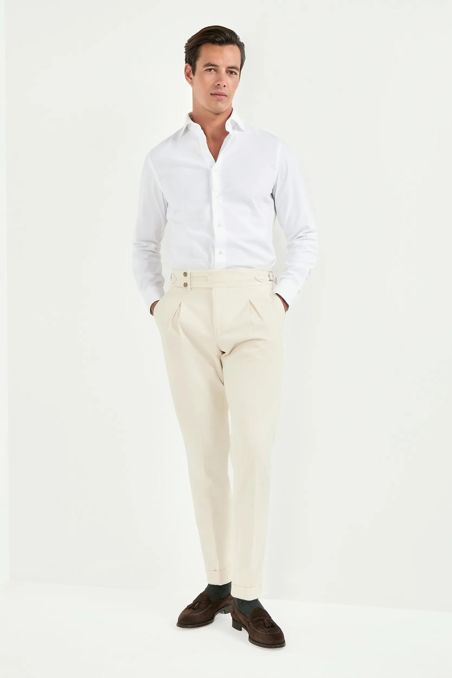 off-white limited edition trousers, men’s tailored trousers, italian wool trousers, off-white smart trousers, limited edition trousers, high-rise slim fit trousers, kissing pleats trousers, side adjusters trousers, large split waistband trousers, elegant men’s trousers, refined italian trousers, luxury off-white trousers, premium italian trousers, hand-finished bespoke trousers, sophisticated men’s trousers, timeless tailored trousers, italian craftsmanship trousers, made in italy trousers, modern tailored 