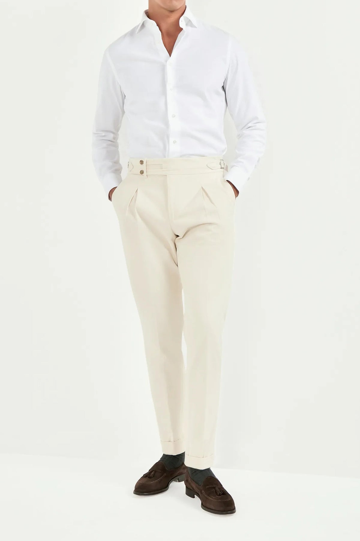 off-white limited edition trousers, men’s tailored trousers, italian wool trousers, off-white smart trousers, limited edition trousers, high-rise slim fit trousers, kissing pleats trousers, side adjusters trousers, large split waistband trousers, elegant men’s trousers, refined italian trousers, luxury off-white trousers, premium italian trousers, hand-finished bespoke trousers, sophisticated men’s trousers, timeless tailored trousers, italian craftsmanship trousers, made in italy trousers, modern tailored 