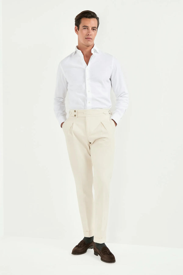 off-white limited edition trousers, men’s tailored trousers, italian wool trousers, off-white smart trousers, limited edition trousers, high-rise slim fit trousers, kissing pleats trousers, side adjusters trousers, large split waistband trousers, elegant men’s trousers, refined italian trousers, luxury off-white trousers, premium italian trousers, hand-finished bespoke trousers, sophisticated men’s trousers, timeless tailored trousers, italian craftsmanship trousers, made in italy trousers, modern tailored 