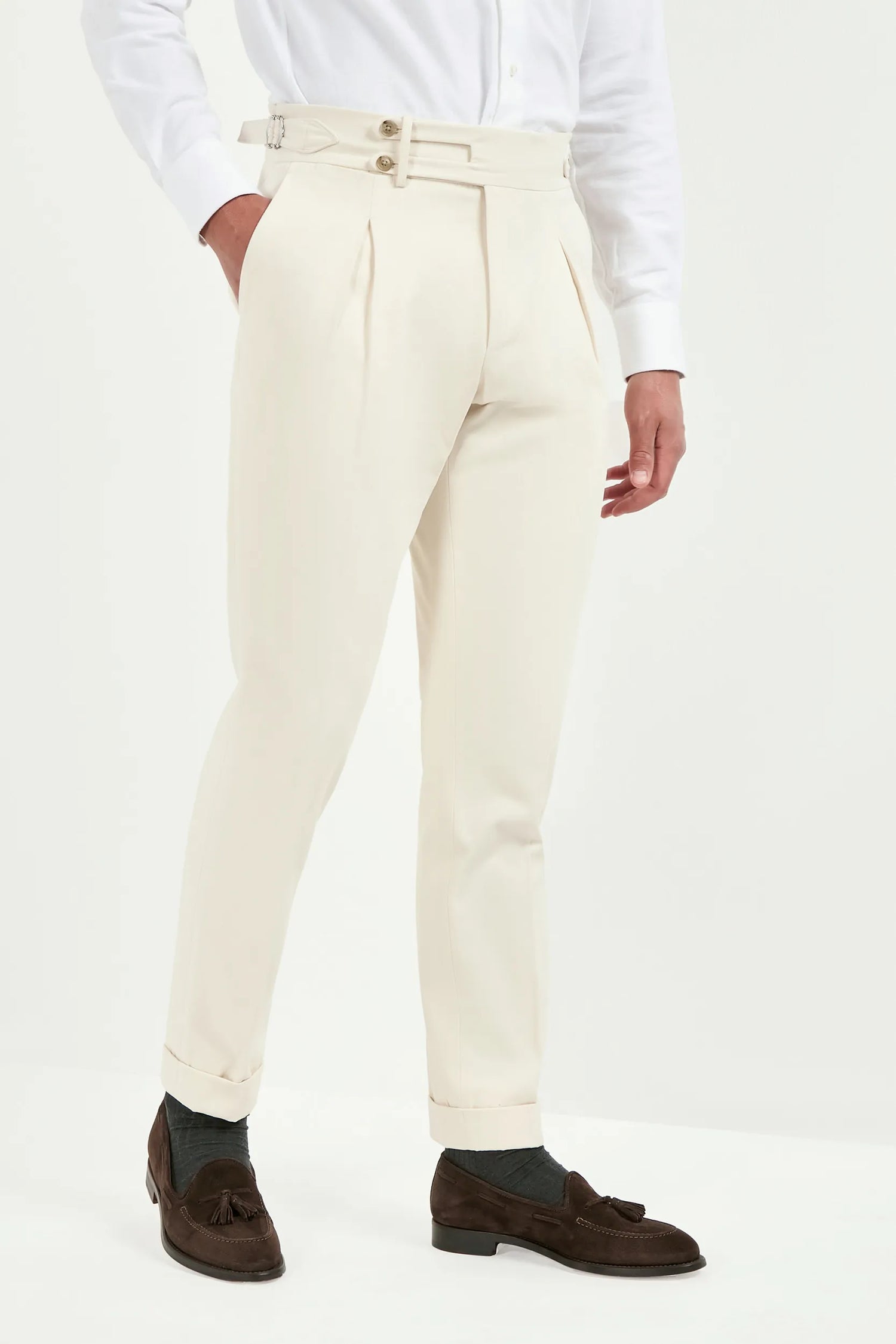 off-white limited edition trousers, men’s tailored trousers, italian wool trousers, off-white smart trousers, limited edition trousers, high-rise slim fit trousers, kissing pleats trousers, side adjusters trousers, large split waistband trousers, elegant men’s trousers, refined italian trousers, luxury off-white trousers, premium italian trousers, hand-finished bespoke trousers, sophisticated men’s trousers, timeless tailored trousers, italian craftsmanship trousers, made in italy trousers, modern tailored 