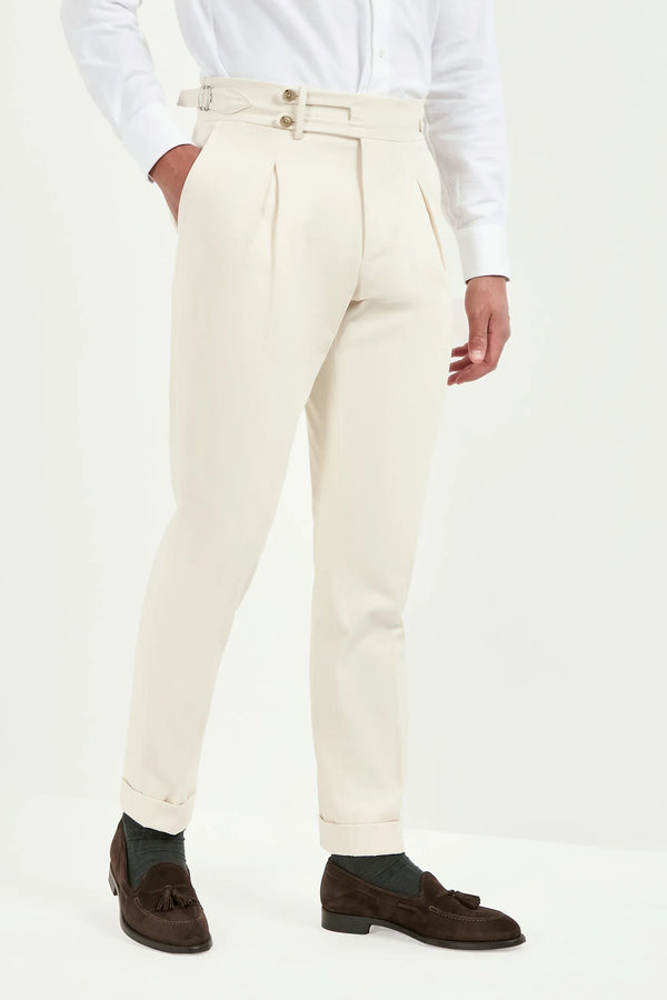 off-white limited edition trousers, men’s tailored trousers, italian wool trousers, off-white smart trousers, limited edition trousers, high-rise slim fit trousers, kissing pleats trousers, side adjusters trousers, large split waistband trousers, elegant men’s trousers, refined italian trousers, luxury off-white trousers, premium italian trousers, hand-finished bespoke trousers, sophisticated men’s trousers, timeless tailored trousers, italian craftsmanship trousers, made in italy trousers, modern tailored 