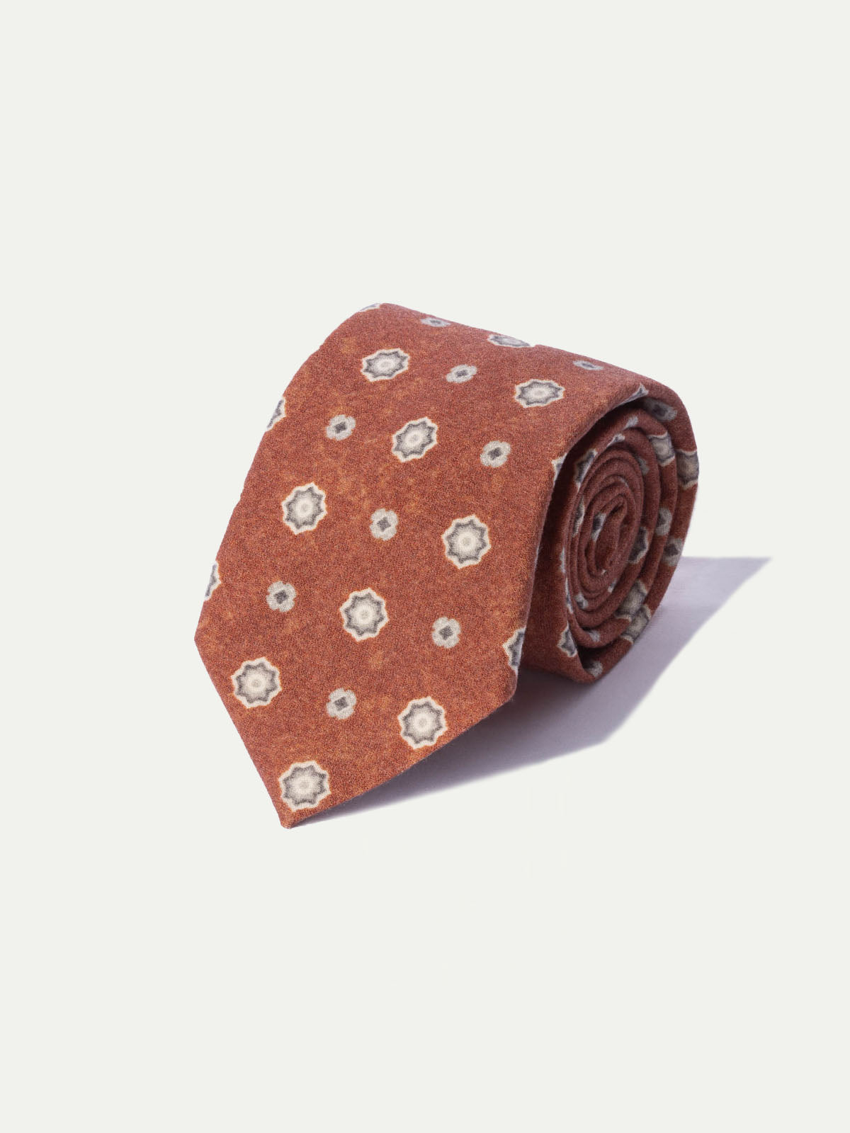 orange patterned tie, rust tie