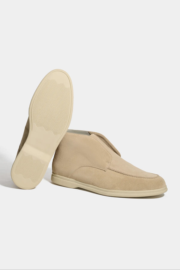 beige polacchino, men suede polacchino, italian suede loafers, beige suede loafers, slip-on suede boot, mid-top suede shoe, made in italy polacchino, luxury suede polacchino, elegant suede footwear, refined italian polacchino, premium suede loafers, soft suede ankle boot, versatile suede shoe, handcrafted italian footwear, timeless polacchino design, comfortable suede loafers, upscale suede shoe, italian craftsmanship polacchino, casual luxury footwear, classic beige suede loafer