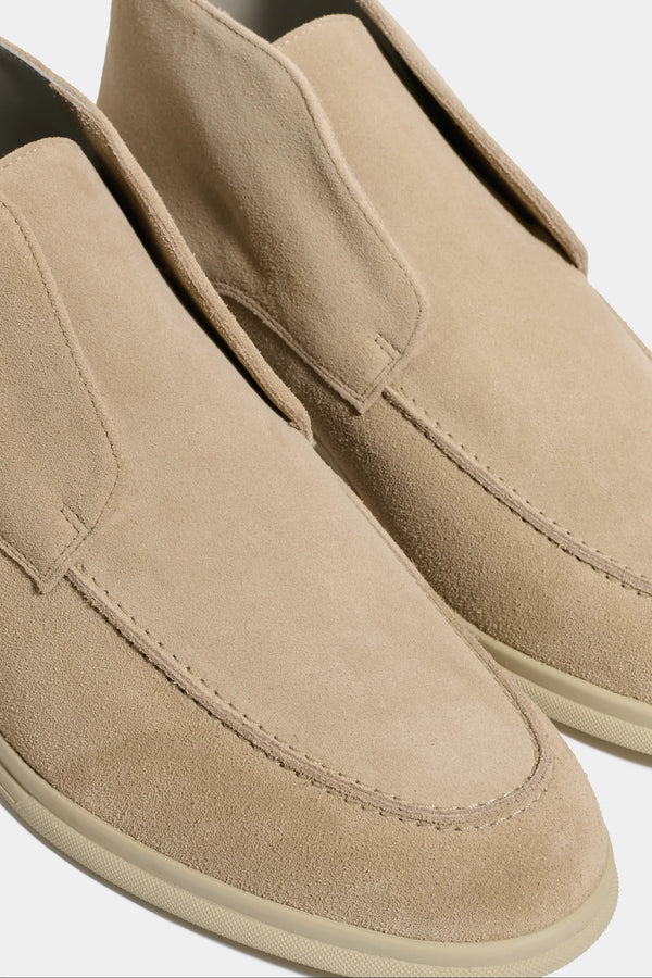 beige polacchino, men suede polacchino, italian suede loafers, beige suede loafers, slip-on suede boot, mid-top suede shoe, made in italy polacchino, luxury suede polacchino, elegant suede footwear, refined italian polacchino, premium suede loafers, soft suede ankle boot, versatile suede shoe, handcrafted italian footwear, timeless polacchino design, comfortable suede loafers, upscale suede shoe, italian craftsmanship polacchino, casual luxury footwear, classic beige suede loafer