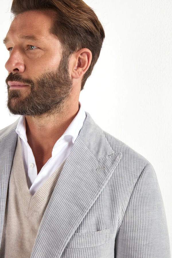 Stone corduroy jacket, Italian style, made in Italy, tailored luxury jacket, elegant menswear piece, refined casual jacket, premium Italian craftsmanship, classic corduroy blazer, sophisticated smart casual jacket, versatile layering piece, polished modern jacket, fine Italian tailoring, upscale menswear jacket, timeless Italian jacket, refined professional look, sharp tailored jacket, luxury casualwear, contemporary corduroy blazer, Italian elegance jacket