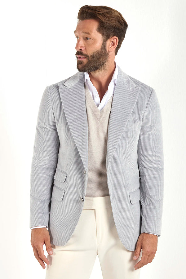 Stone corduroy jacket, Italian style, made in Italy, tailored luxury jacket, elegant menswear piece, refined casual jacket, premium Italian craftsmanship, classic corduroy blazer, sophisticated smart casual jacket, versatile layering piece, polished modern jacket, fine Italian tailoring, upscale menswear jacket, timeless Italian jacket, refined professional look, sharp tailored jacket, luxury casualwear, contemporary corduroy blazer, Italian elegance jacket