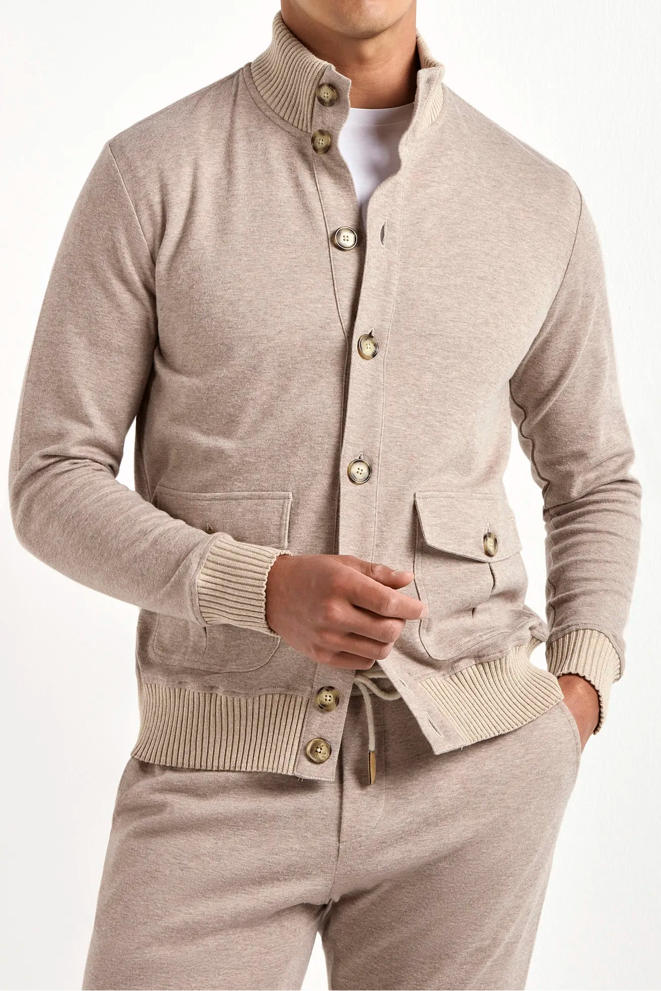 taupe jersey cardigan, men jersey cardigan, italian jersey cardigan, taupe wool jersey cardigan, luxury men's jersey cardigan, elegant men's jersey cardigan, refined wool jersey cardigan, tailored taupe jersey cardigan, premium italian jersey cardigan, sophisticated men's jersey cardigan, timeless italian jersey cardigan, upscale men's jersey cardigan, classic taupe jersey cardigan, italian craftsmanship jersey cardigan, premium men's taupe cardigan, refined italian wool cardigan