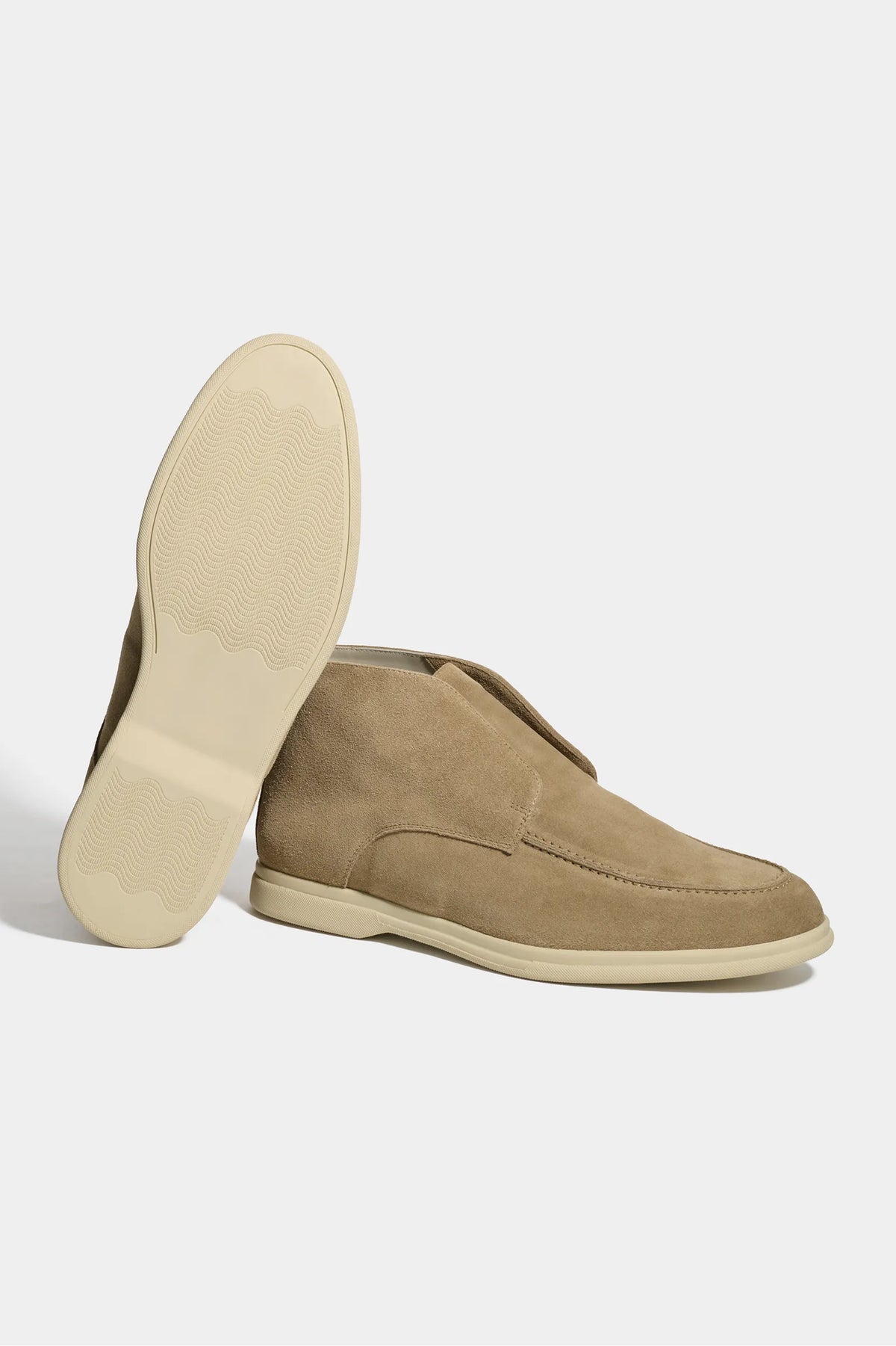taupe polacchino, men suede polacchino, italian suede loafers, taupe suede loafers, slip-on suede boot, mid-top suede shoe, made in italy polacchino, luxury suede polacchino, elegant suede footwear, refined italian polacchino, premium suede loafers, soft suede ankle boot, versatile suede shoe, handcrafted italian footwear, timeless polacchino design, comfortable suede loafers, upscale suede shoe, italian craftsmanship polacchino, casual luxury footwear, classic taupe suede loafer
