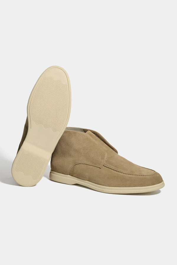 taupe polacchino, men suede polacchino, italian suede loafers, taupe suede loafers, slip-on suede boot, mid-top suede shoe, made in italy polacchino, luxury suede polacchino, elegant suede footwear, refined italian polacchino, premium suede loafers, soft suede ankle boot, versatile suede shoe, handcrafted italian footwear, timeless polacchino design, comfortable suede loafers, upscale suede shoe, italian craftsmanship polacchino, casual luxury footwear, classic taupe suede loafer