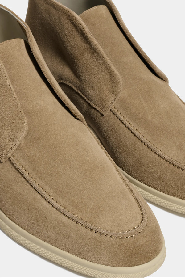 taupe polacchino, men suede polacchino, italian suede loafers, taupe suede loafers, slip-on suede boot, mid-top suede shoe, made in italy polacchino, luxury suede polacchino, elegant suede footwear, refined italian polacchino, premium suede loafers, soft suede ankle boot, versatile suede shoe, handcrafted italian footwear, timeless polacchino design, comfortable suede loafers, upscale suede shoe, italian craftsmanship polacchino, casual luxury footwear, classic taupe suede loafer