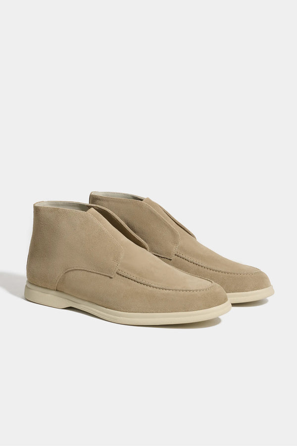 taupe polacchino, men suede polacchino, italian suede loafers, taupe suede loafers, slip-on suede boot, mid-top suede shoe, made in italy polacchino, luxury suede polacchino, elegant suede footwear, refined italian polacchino, premium suede loafers, soft suede ankle boot, versatile suede shoe, handcrafted italian footwear, timeless polacchino design, comfortable suede loafers, upscale suede shoe, italian craftsmanship polacchino, casual luxury footwear, classic taupe suede loafer