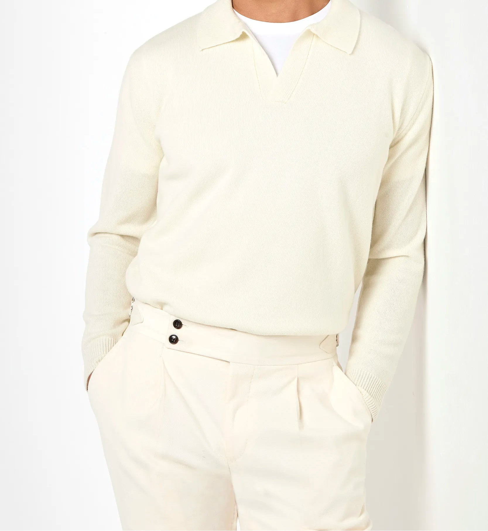 white wool polo, men's wool polo, italian wool polo, white knit polo, luxury men's polo, elegant men's polo, refined wool polo, tailored white polo, premium italian polo, sophisticated men's polo, timeless italian polo, upscale men's polo, classic white polo, italian craftsmanship polo, premium men's knit polo, refined italian wool polo