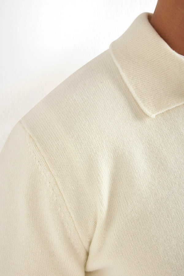white wool polo, men's wool polo, italian wool polo, white knit polo, luxury men's polo, elegant men's polo, refined wool polo, tailored white polo, premium italian polo, sophisticated men's polo, timeless italian polo, upscale men's polo, classic white polo, italian craftsmanship polo, premium men's knit polo, refined italian wool polo