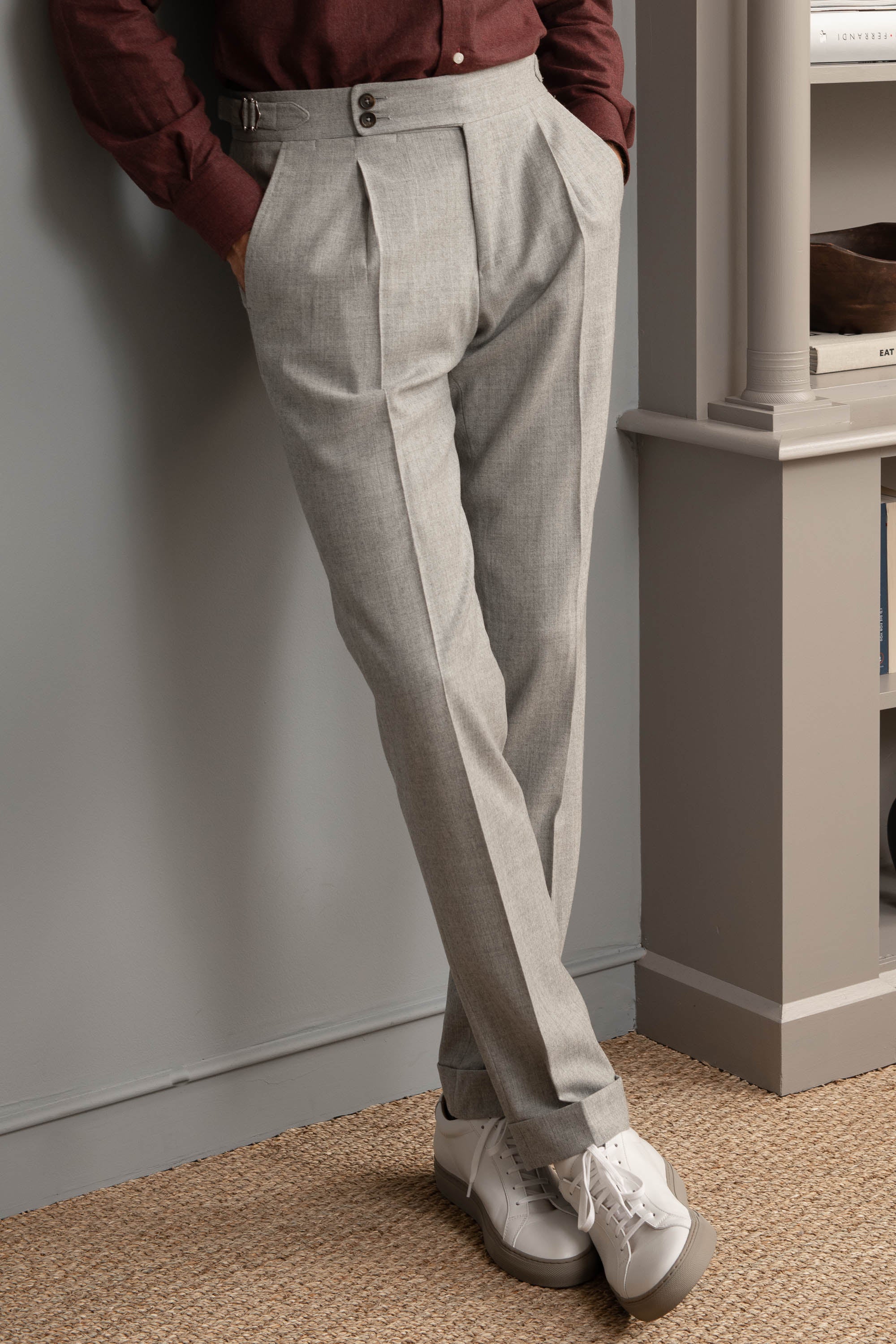 Grey flannel trousers  Blue loafers