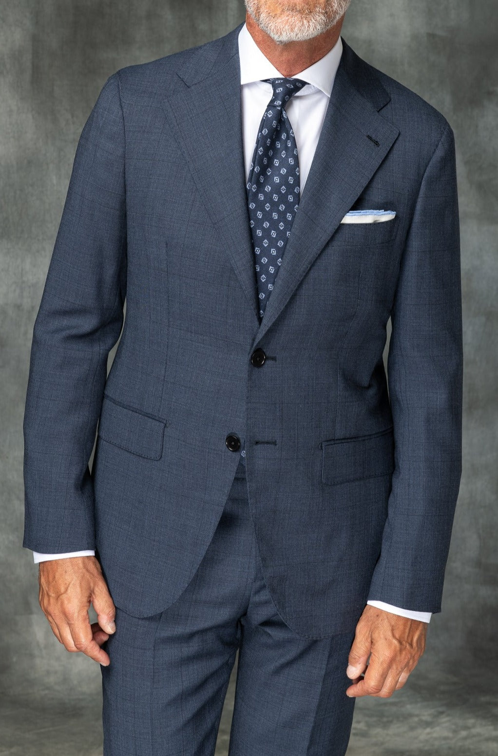 Blue Avio Prince of Wales Full Canvas suit in Loro Piana Wool - Made in Italy